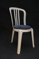 White dining chair with blue cushion