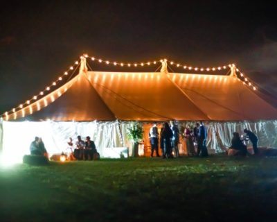 Traditional marquee with exterior string lighting
