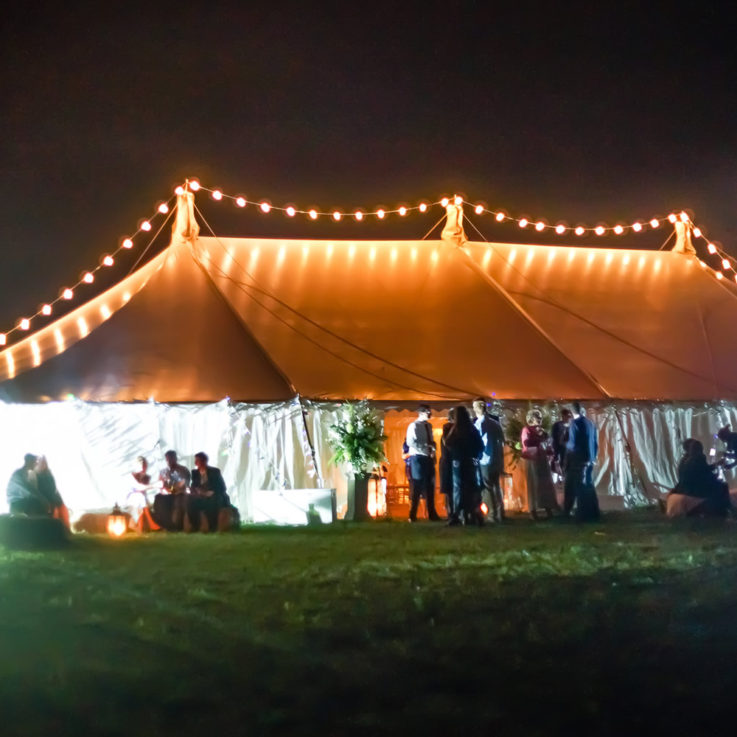 Traditional marquee with exterior string lighting