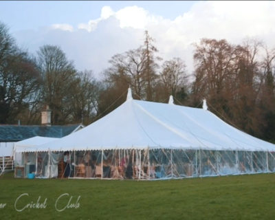 Traditional marquee on cricket pitch