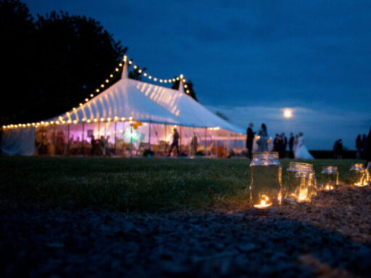 cropped-traditional-marquee-at-night-with-candles.jpg