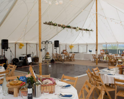 traditional marquee with wooden centre poles