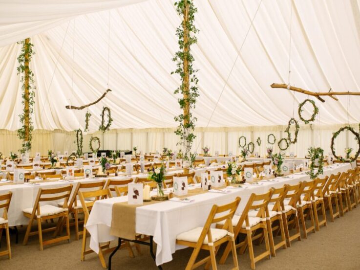 Traditional style marquee with Ivory Lining and wooden folding chairs