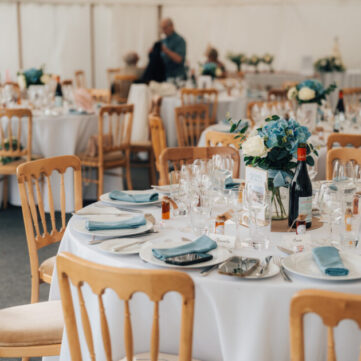 Natural wood chairs at 5ft6 Round tables