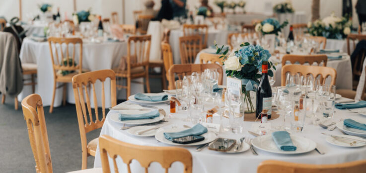 Natural wood chairs at 5ft6 Round tables